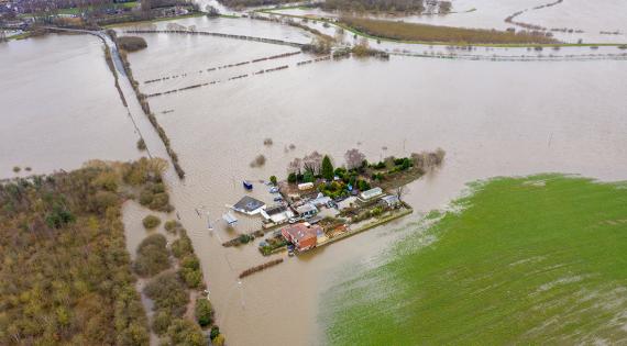 arial drone photo of Allerton Bywater in West Yorkshire showing flooded fields and farm