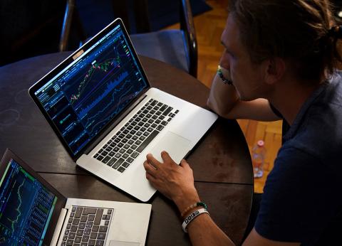 Person viewing data on a laptop