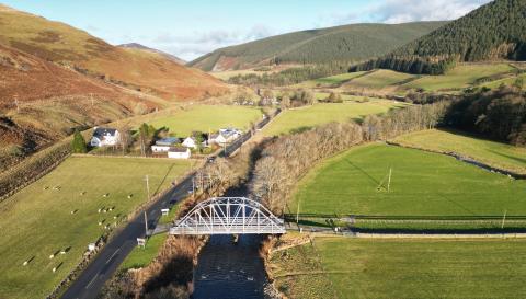 The landscape around the river Tweed at Hearthstane Bridge