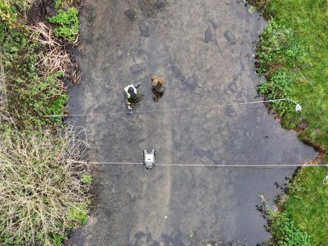 Field techs test an ADCP in the River Chess