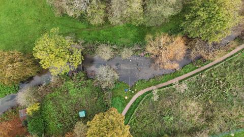 Arial view of the Chess chalk stream, surrounded by foliage 