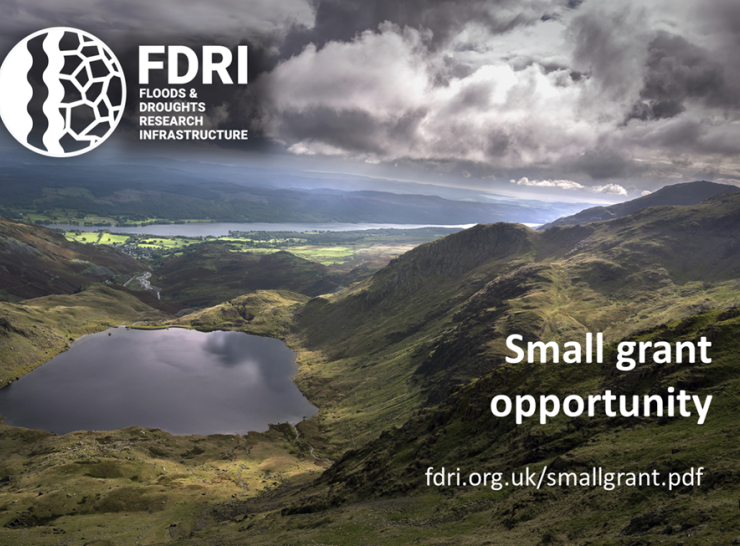 Lake and hills with clouds and wording small grant opportunity